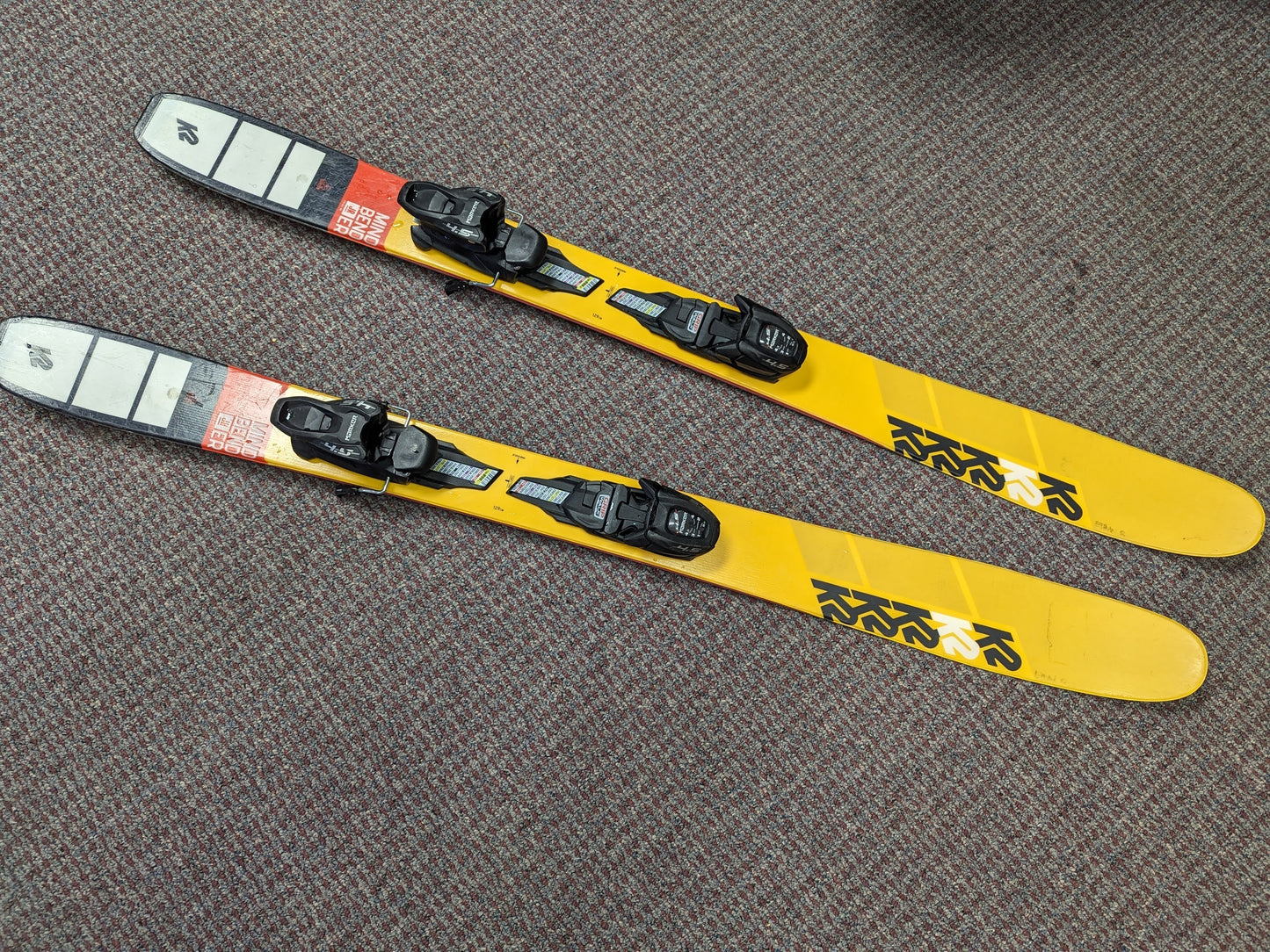 K2 Mindbender Jr Twin Tip Skis w/Marker Bindings Size 129 Cm Color Yellow Used